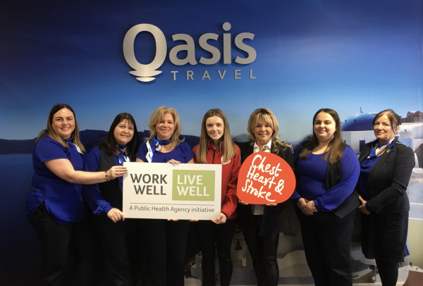 Oasis Travel Rebecca Hawkins Workplace Health and Wellbeing Co ordinator at Northern Ireland Chest Heart Stroke with staff from Oasis Travel