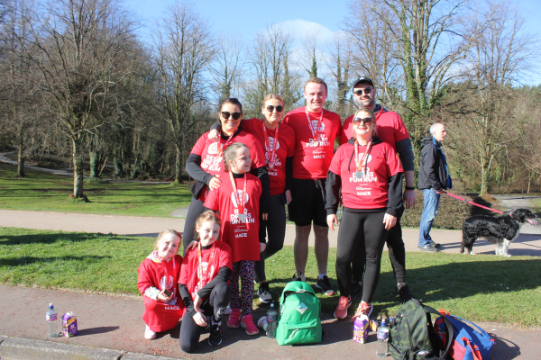 Terri and family at Red Dress Fun Run 2023