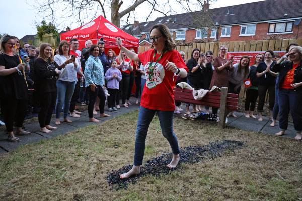 Stroke survivor Jennie goes from being unable to walk to walking on fire to raise over £18,000 for local charity